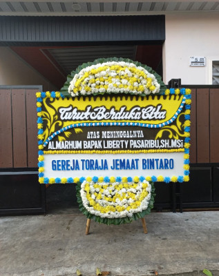 Papan Bunga Duka di Pentadu Timur